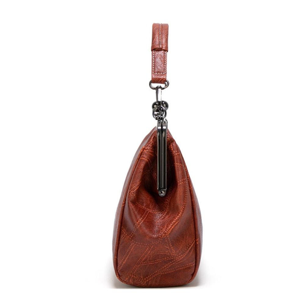 Solmira Celeste Kiss-Lock Bag - Eleganza vintage con un tocco cosmico