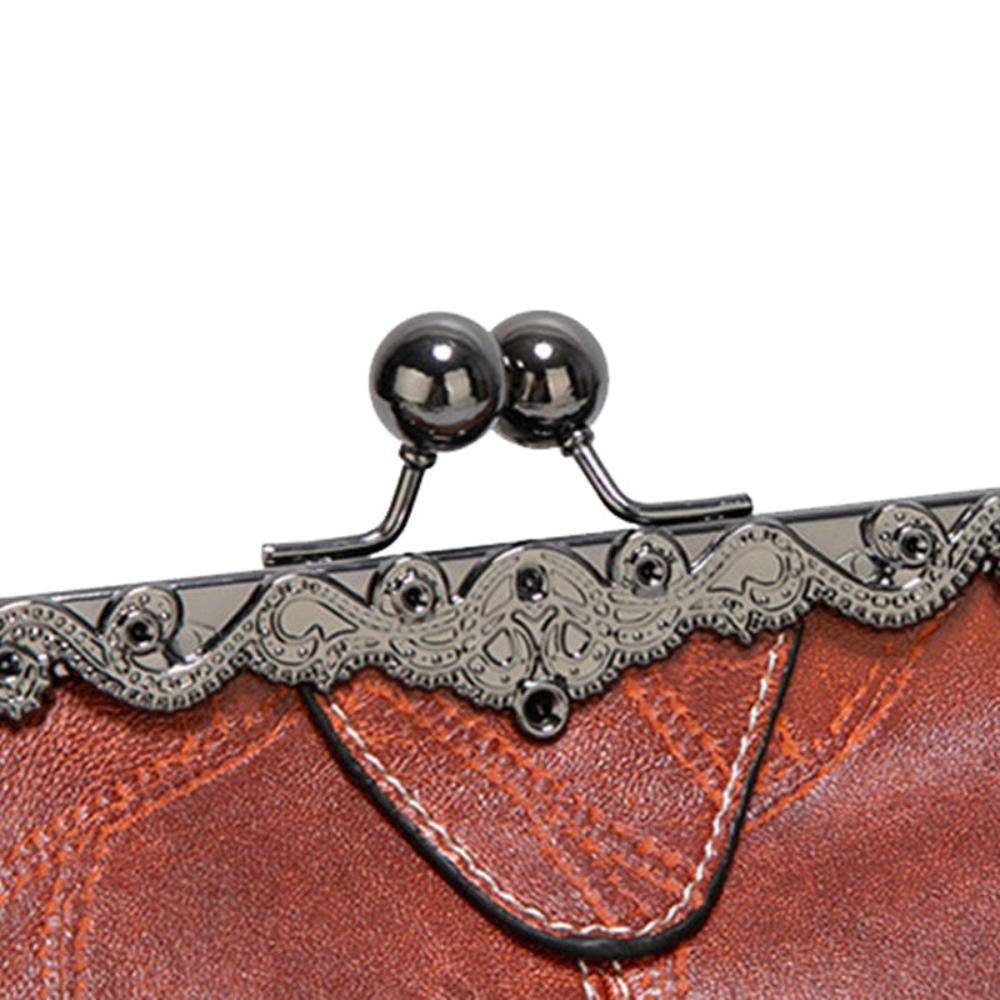 Solmira Celeste Kiss-Lock Bag - Eleganza vintage con un tocco cosmico