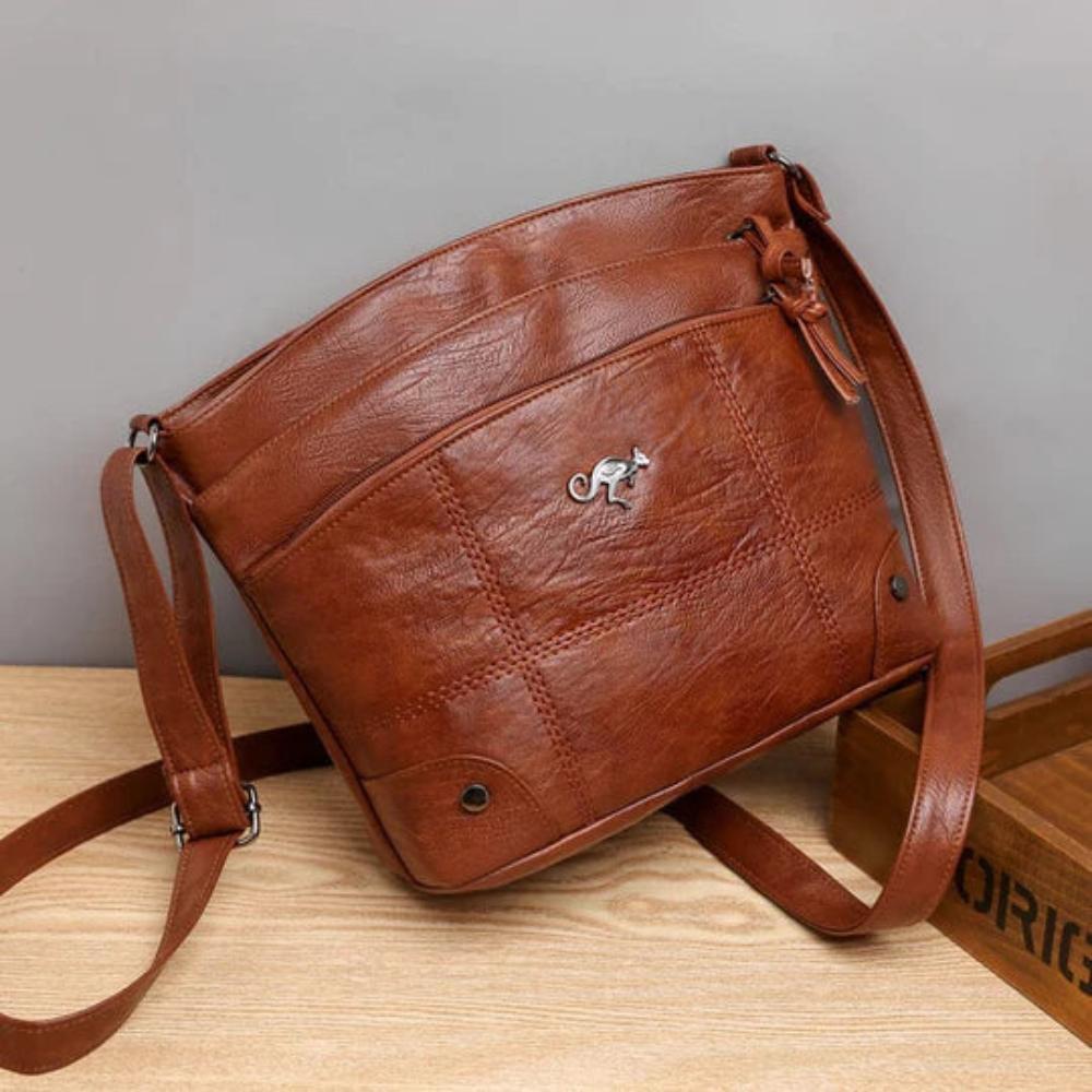 Elaris Saddle Cross | Borsa a tracolla in pelle artigianale