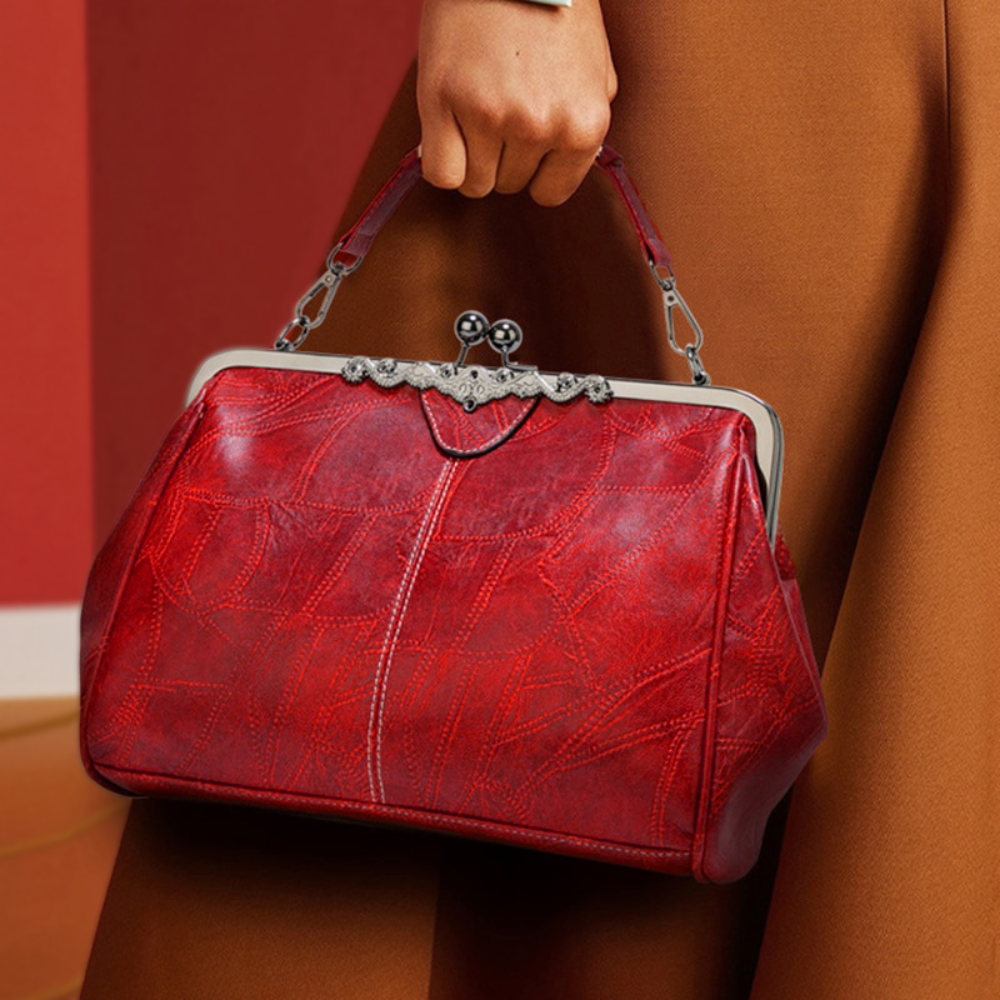 Solmira Celeste Kiss-Lock Bag - Eleganza vintage con un tocco cosmico