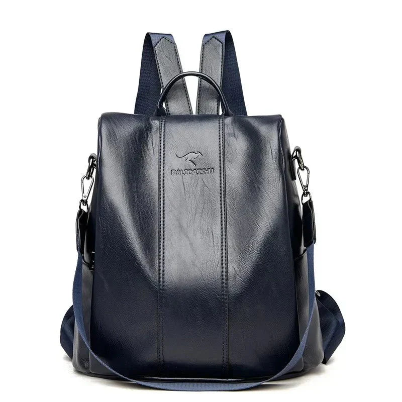 A stylish women's backpack with a sleek design, featuring a sturdy handle, adjustable shoulder straps, and side hooks for versatile carrying options. The bag has a smooth finish and a spacious main compartment, ideal for everyday use or travel.