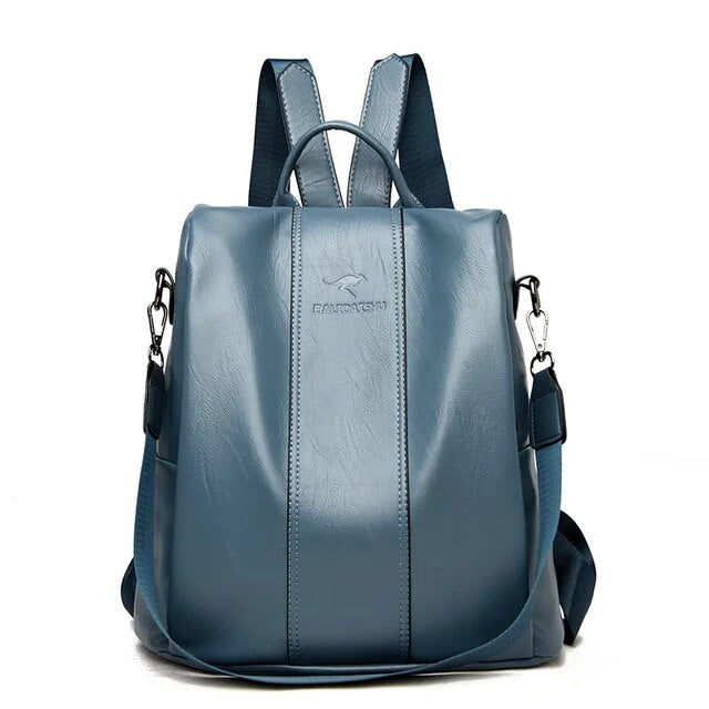 A stylish women's backpack with a sleek design, featuring a sturdy handle, adjustable shoulder straps, and side hooks for versatile carrying options. The bag has a smooth finish and a spacious main compartment, ideal for everyday use or travel.