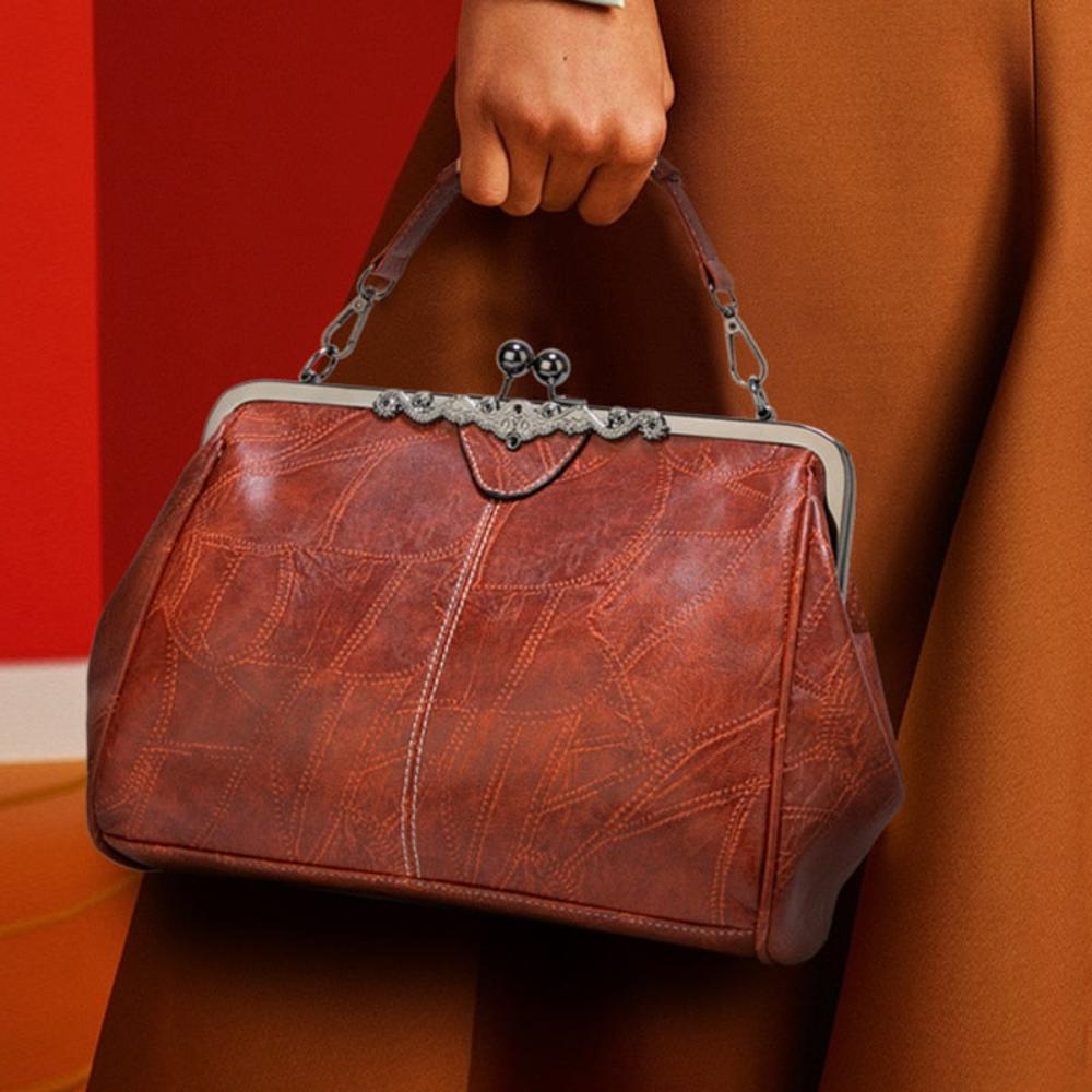 Solmira Celeste Kiss-Lock Bag - Eleganza vintage con un tocco cosmico