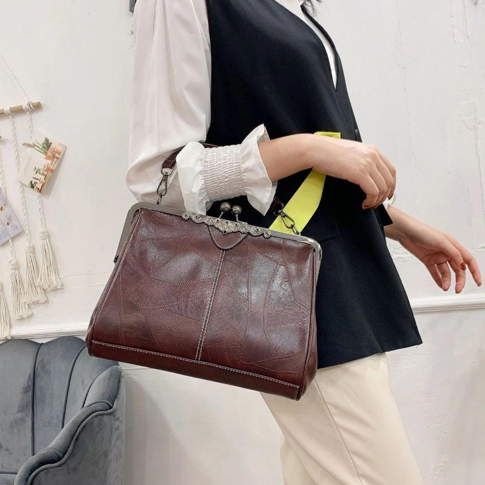 Solmira Celeste Kiss-Lock Bag - Eleganza vintage con un tocco cosmico