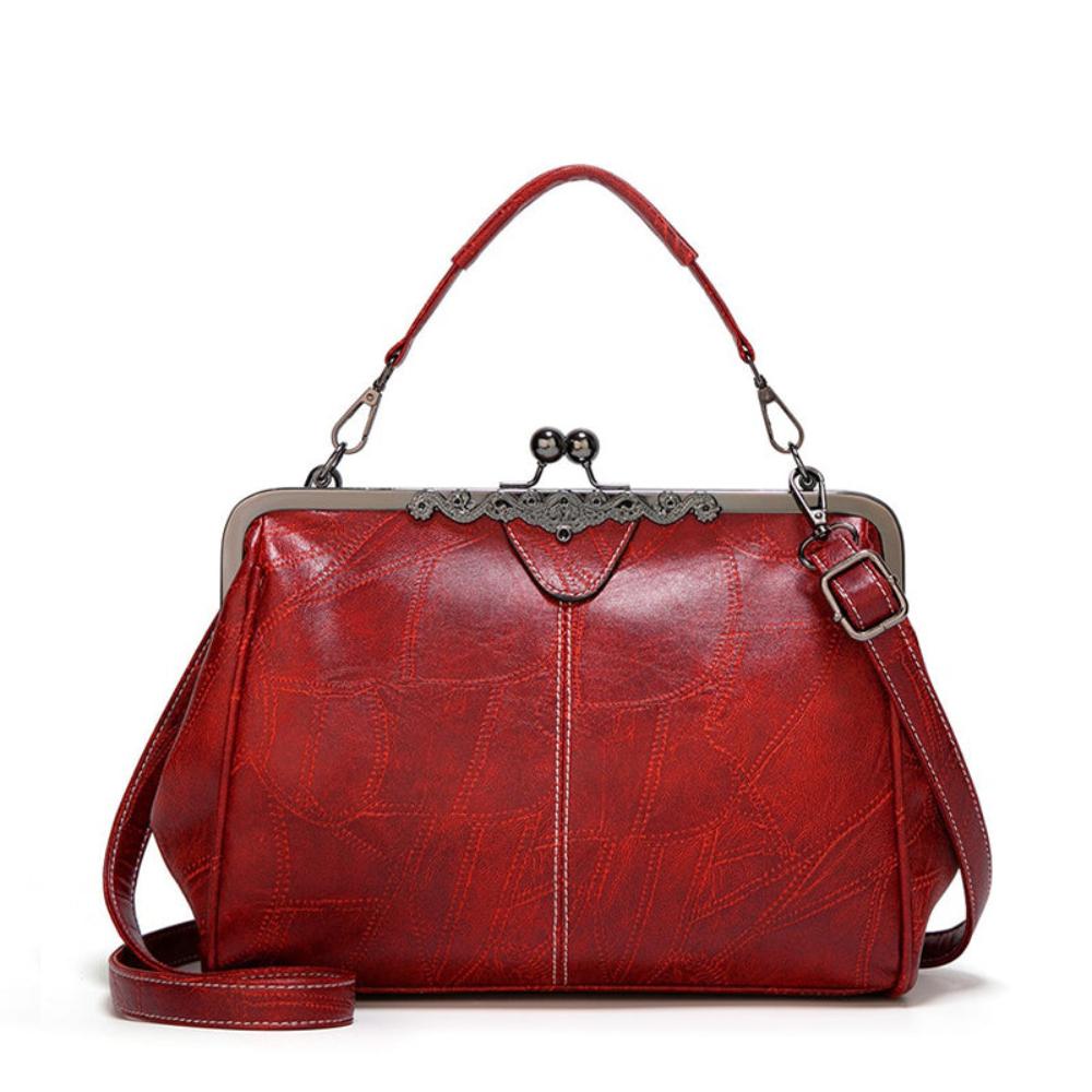 Solmira Celeste Kiss-Lock Bag - Eleganza vintage con un tocco cosmico