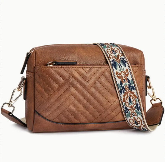 Lisa, la borsa a tracolla in pelle elegantemente giocosa