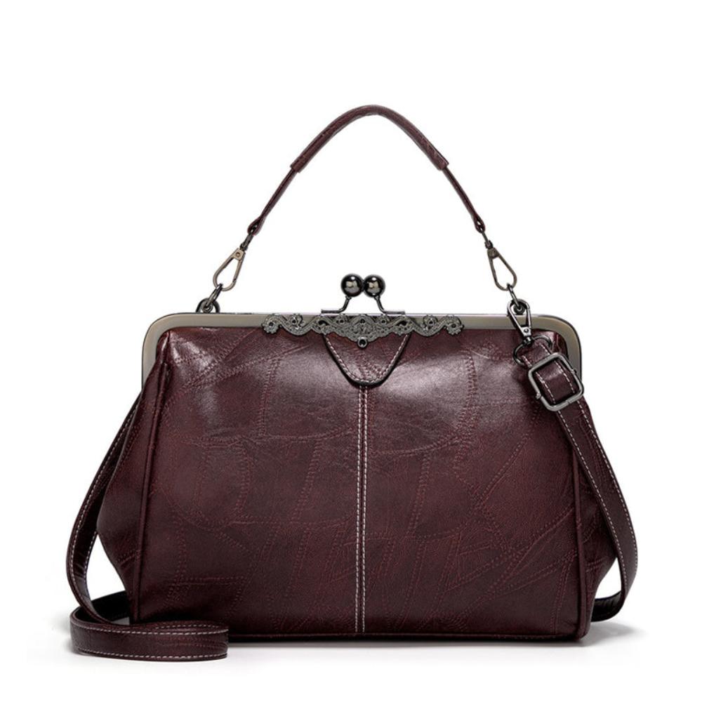 Solmira Celeste Kiss-Lock Bag - Eleganza vintage con un tocco cosmico