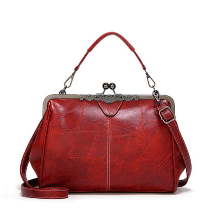 Solmira Celeste Kiss-Lock Bag - Eleganza vintage con un tocco cosmico