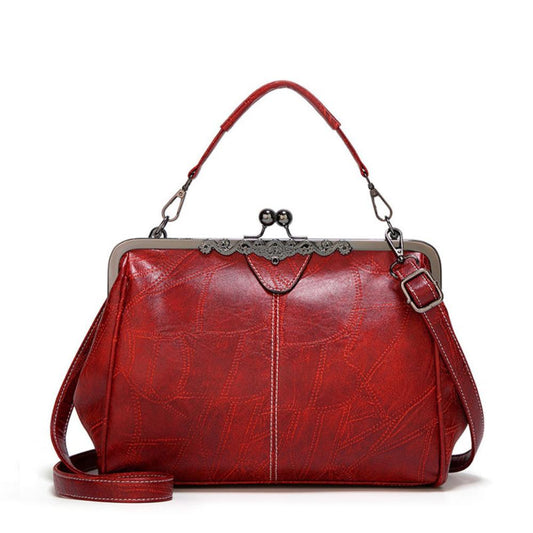 Solmira Celeste Kiss-Lock Bag - Eleganza vintage con un tocco cosmico